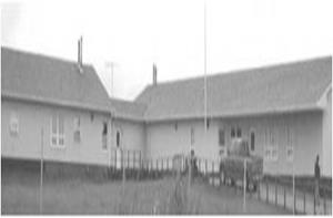 A black and white photo of the Kashechewan Nursing Station. 